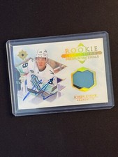 2023-24 Rookie Signatures Premium Materials Ryker Evans RSM-RE /65