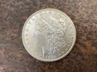 1884-CC Morgan Silver Dollar Uncirculated/Mint with 33% tarnish on reverse side
