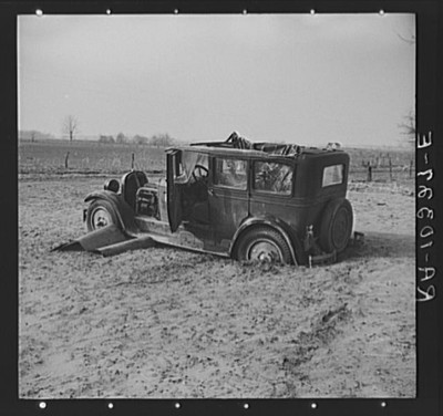 Automobile after the flood on Mackey Ferry Road near Mount Vernon, Indiana