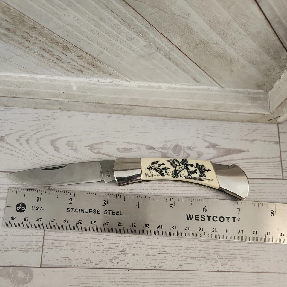 Navaja de bolsillo vintage Sabre China imitación hueso. Foto 3 de 4