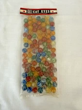 Unopened 25 cent Bag of 100 VITRO Cat Eye Marbles NEW Old Stock Made In The USA