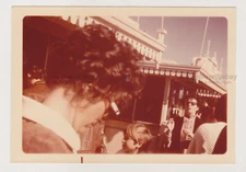 Street Snapshot Woman's Head Close to the Camera as People Walk By Unusual Photo