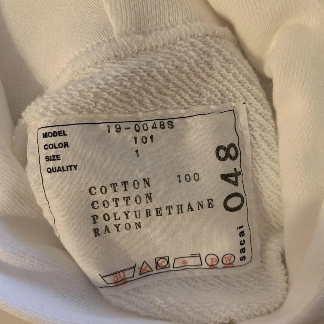 Felpa con cappuccio collaborazione Sacai Dr Woo esaurita