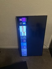 Samsung Smart Tv Which Includes Remote, Stands With Screws And A Tv Bracket