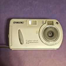 Sony Cyber-shot DSC-P32 DigitalCamera Silver 3.2MP for parts only. Won't turn on