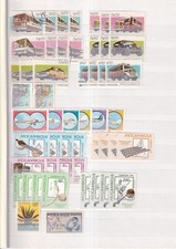 SA27g Mostly Congo & Mozambique 1960 s -1980 s used stamps in album page