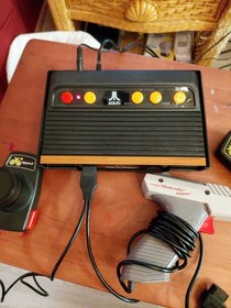 Atari flashback 7 classic game console Tested/ With Nes light Gun as-is Overall 