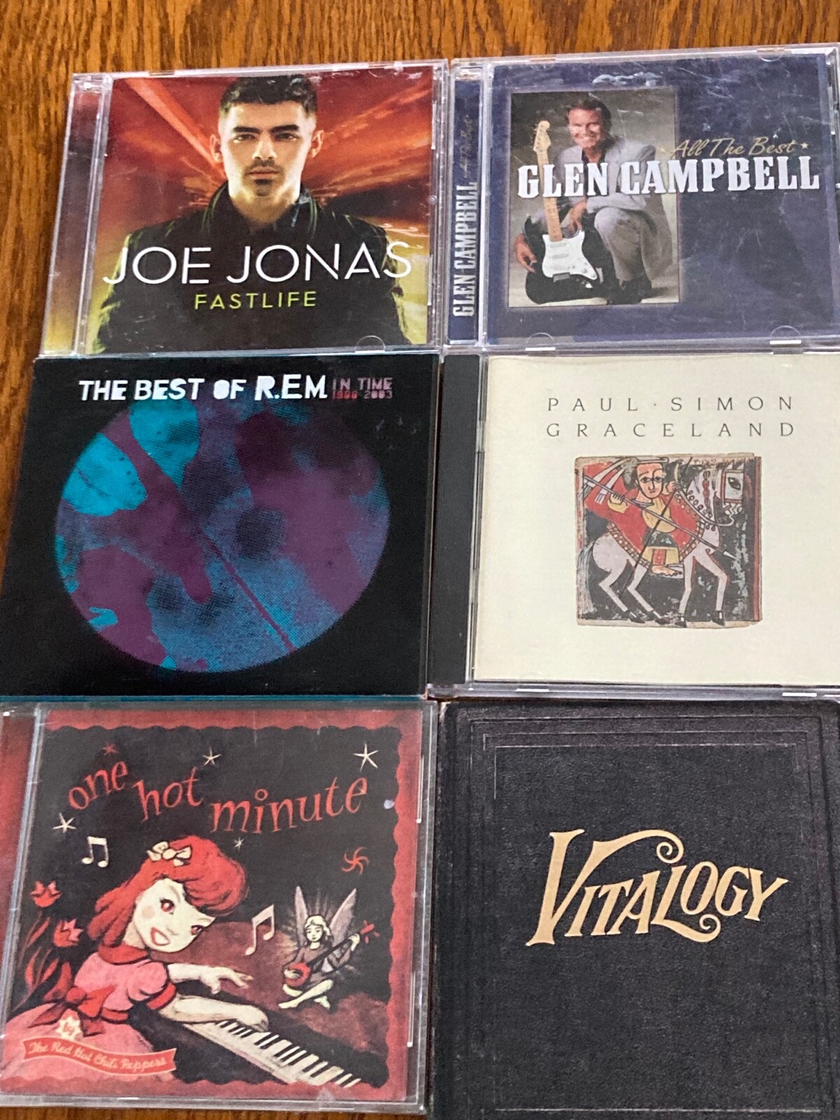 Lot Of 6 Male Artists CD's , R.E.M., Joe Jonas, Pearl Jam, Chili Peppers