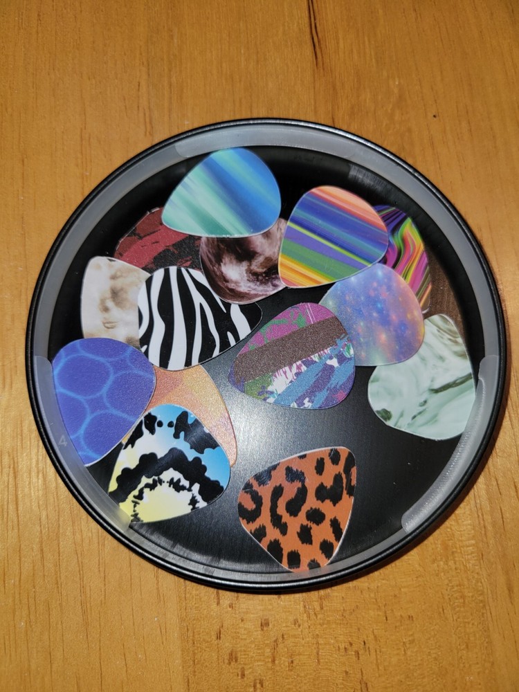*Handmade guitar picks Mystery Pack Of  10.  A % Of Profit Goes To Charity !!