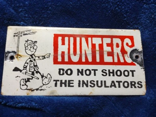 VINTAGE REDDY KILOWATT HUNTERS DO NOT SHOOT AT INSULATORS PORCELAIN METAL SIGN