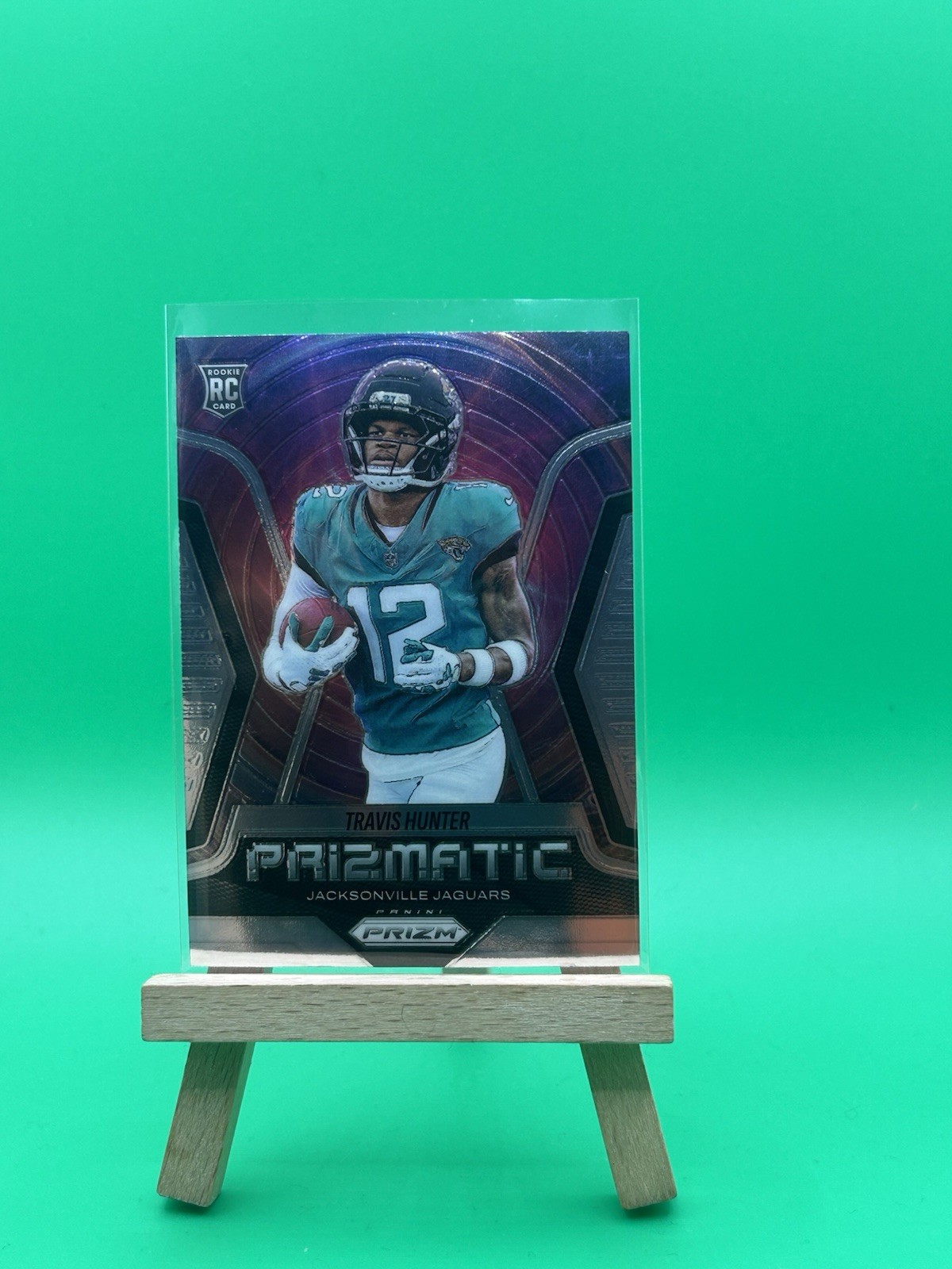 2025 Panini Prizm Travis Hunter Rookie PRIZMATIC #12 Jacksonville Jaguars RC