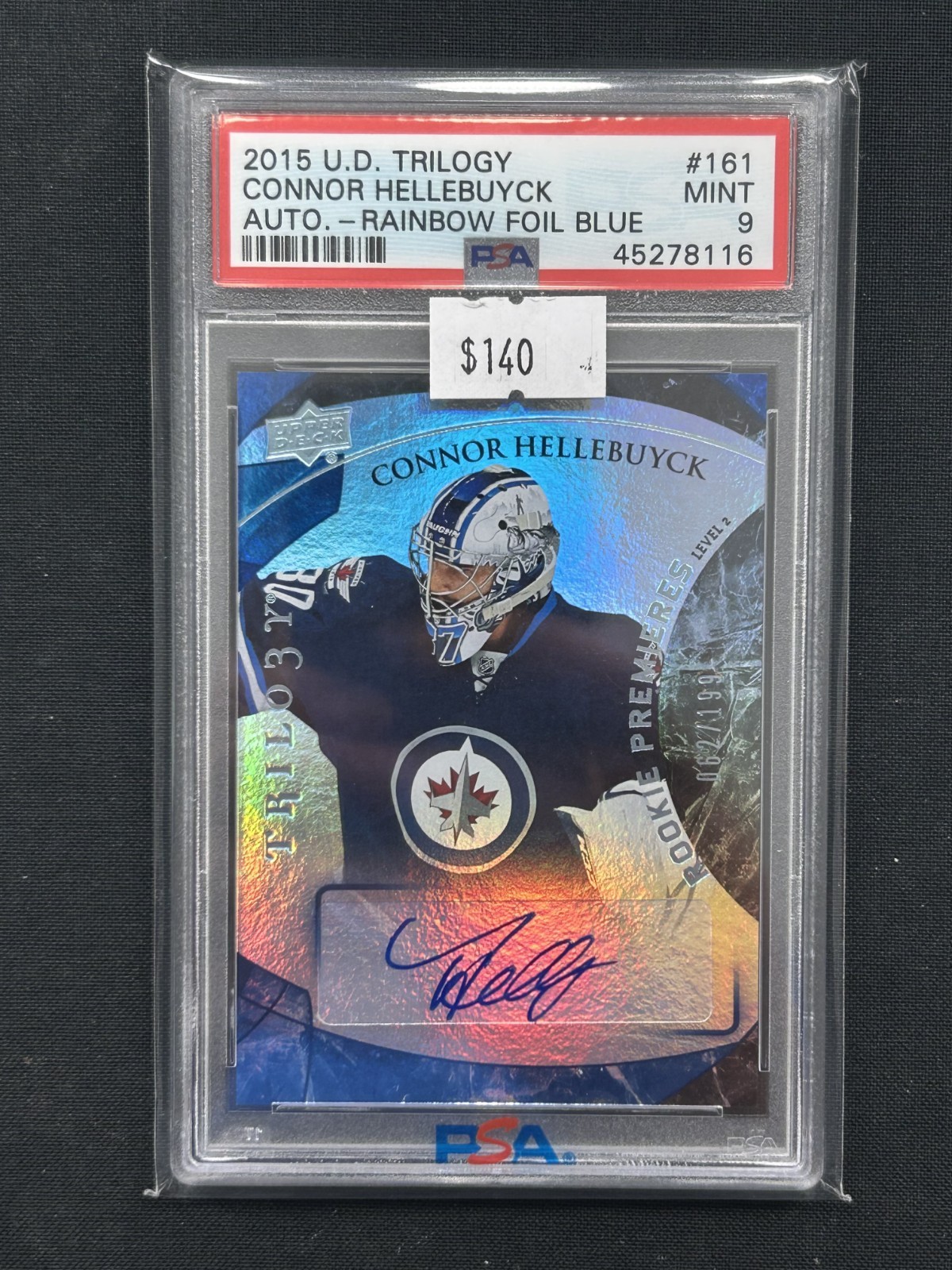 2015 Upper Deck UPPER DECK TRILOGY AUTO.-RAINBOW FOIL BLUE #161 Connor Hellebuyck front