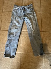 These are a pair of Levi's 550 Relaxed Fit denim jeans. Made In USA