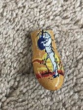 Vintage Tin Lithograph Clicker Noisemaker with Woman With Mandolin Design