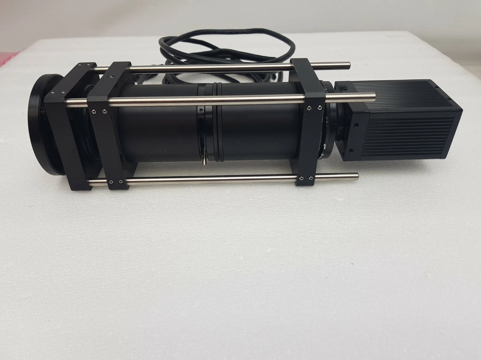Side view of the LW-5-S-1394-C camera and optical tube with cage rods and mounting plates