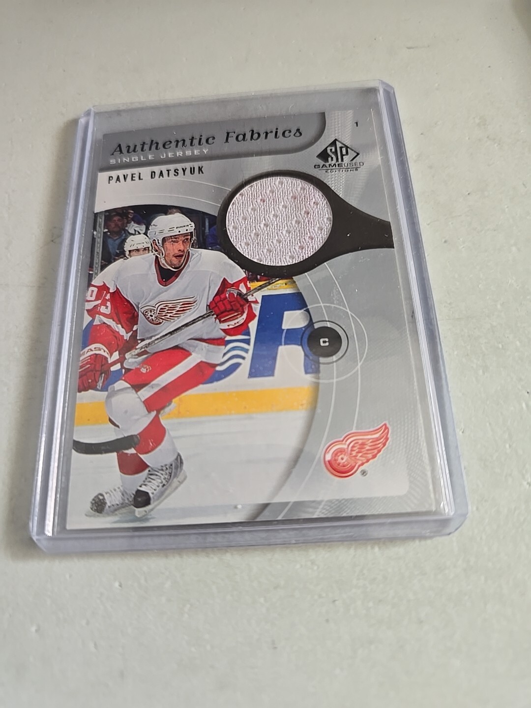 2005-06 PAVEL DATSYUK SP GAME USED WHITE JERSEY CARD. DETROIT RED WINGS.
