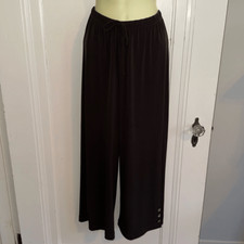 Chico s black pull on full leg cropped polyester/spandex pants