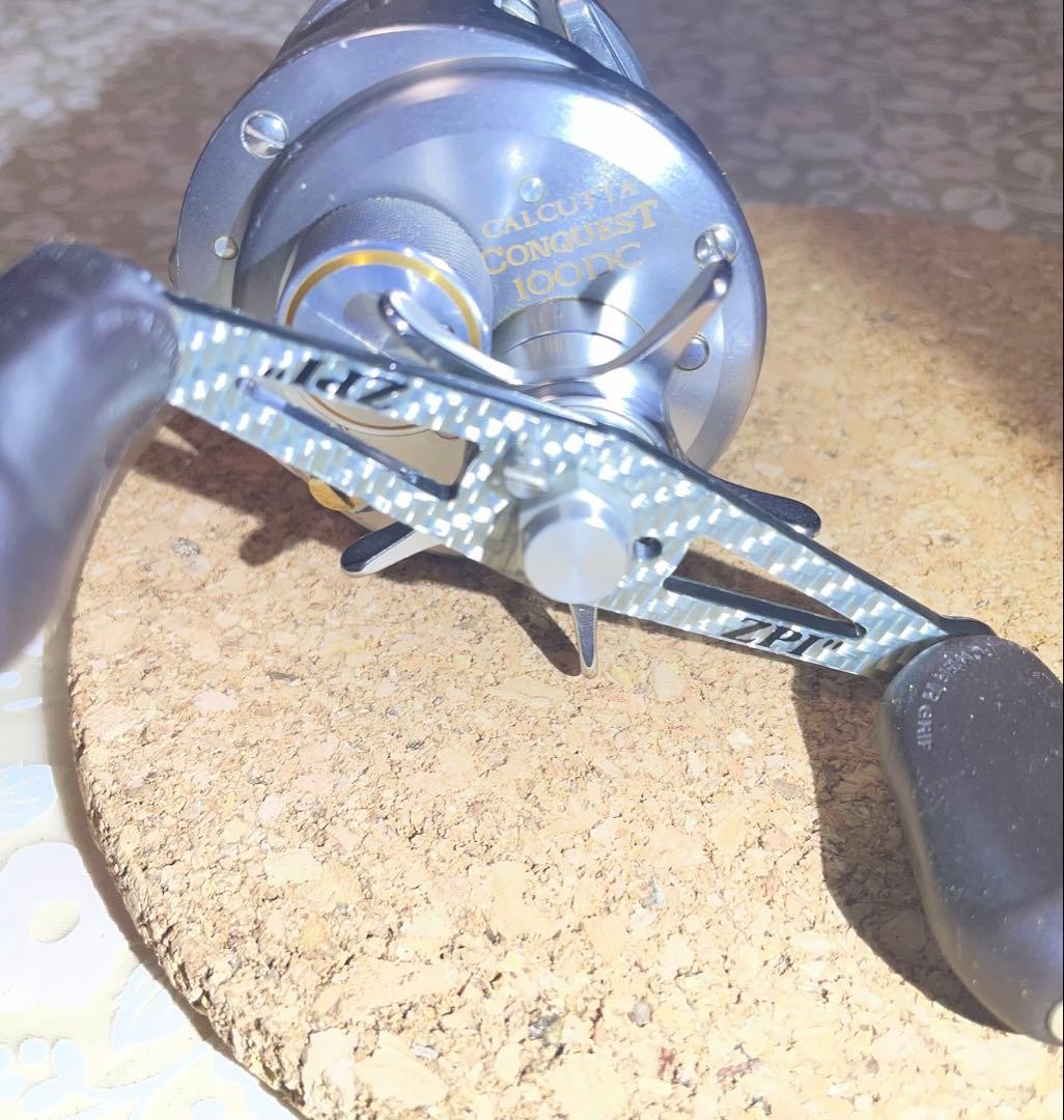 SHIMANO CALCUTTA CONQUEST 100DC ZPI Carbon Handle Fishing Reel