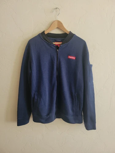 Sweat Supreme bleu marine avec logo zippé avec poches