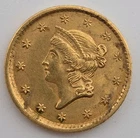 1854 Gold Dollar — photo from another recent sale