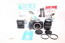 Canon EOS Kiss X3 DSLR Camera with Image Stabilization and Accessories