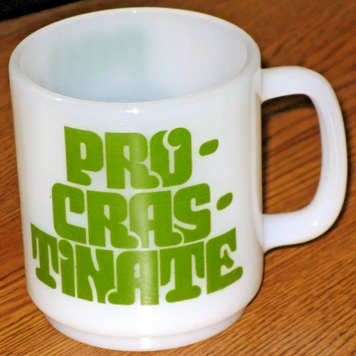 VINTAGE 1970's PROGRASTINATE MILK GLASS w AVOCADO GREEN LETTERING COFFEE CUP MUG