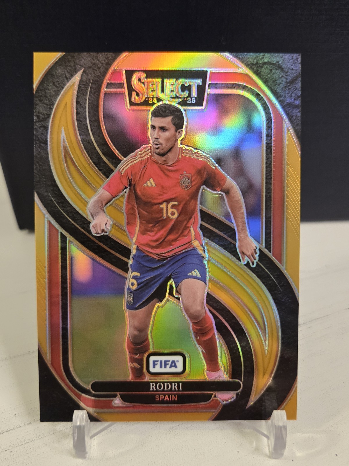 Rodri 2024 2024-25 Panini Select FIFA #189 Mezzanine Level Gold Prizm 10/10