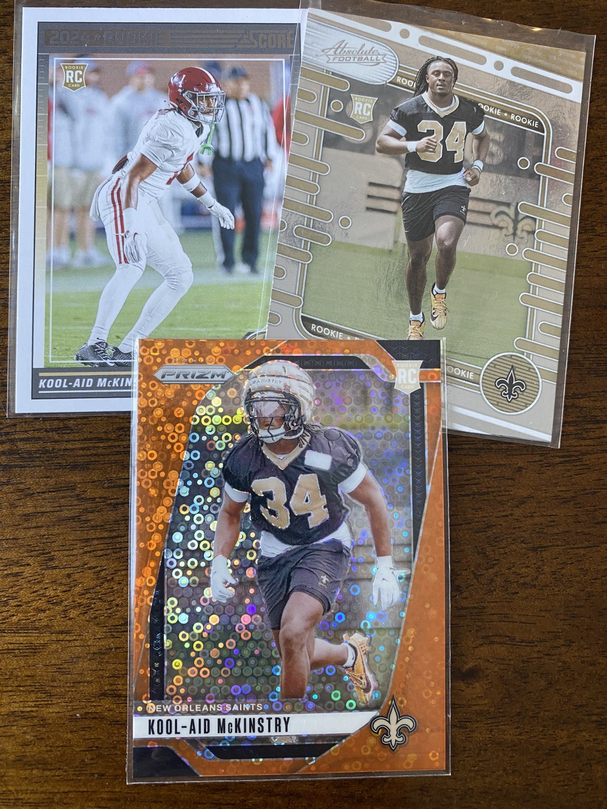 3 ROOKIE Card Lot: CB Kool-Aid McKinstry Saints, incl. ORANGE DISCO