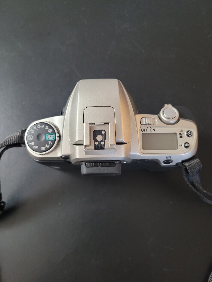 Pentax ZX-7 35mm SLR Camera with Power Grip Under and 35-80 Lens