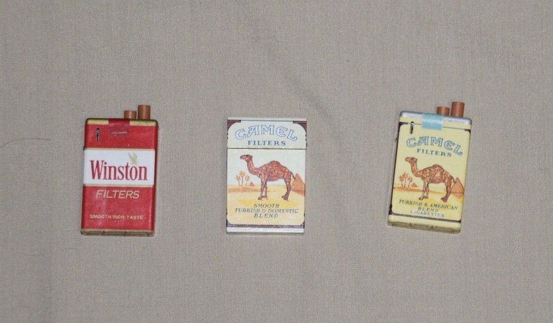 One Vintage Winston and Two Vintage Camel Lighters are in good condition
