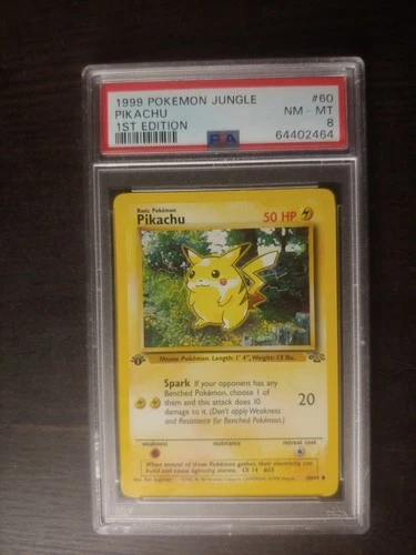 Pokemon 1999 Pikachu #60 1st Edition Jungle PSA 8