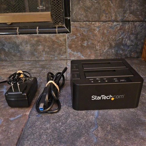 StarTech.com SDOCK2U313R  comes with Power Cable and USB Cable. 