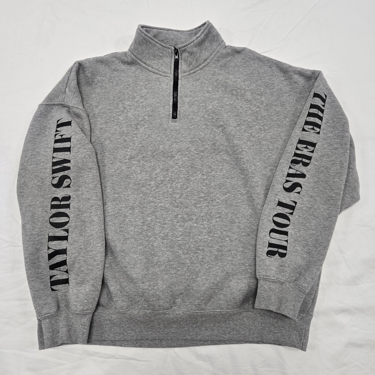 テイラー・スウィフト The Eras Tour II クォータージップ L Taylor Swift The Eras International Tour Grey Quarter Zip