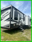 2022 Keystone Raptor 413 43ft Toy Hauler 3 Slides 13ft Garage 1.5 Baths Sleeps 7