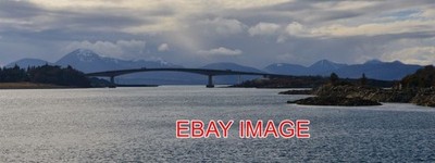 PHOTO  A DARK SKY THREATENS RAIN FOR THE SKYE BRIDGE BUT IN THE EVENT NOTHING RE