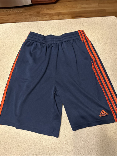 Adidas youth extra large navy blue with orange three striped shorts
