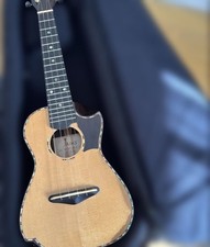 Acoustic ukulele with case sold separately