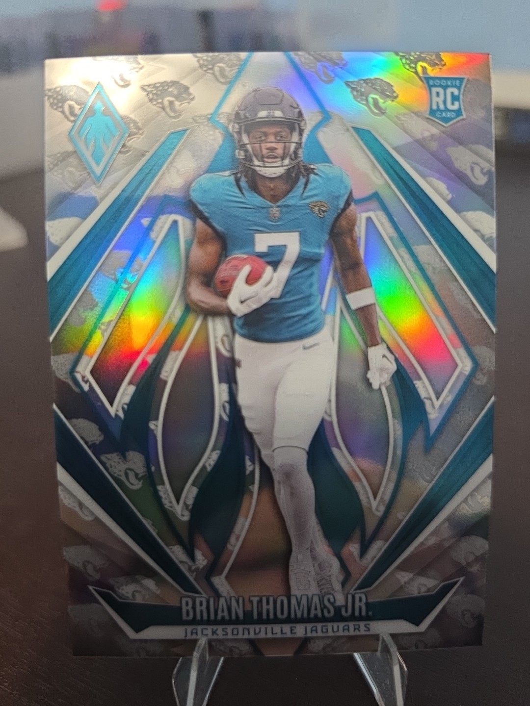 2024 Panini Phoenix - Rookies Brian Thomas Jr. #164 Team Logos /299 (RC)