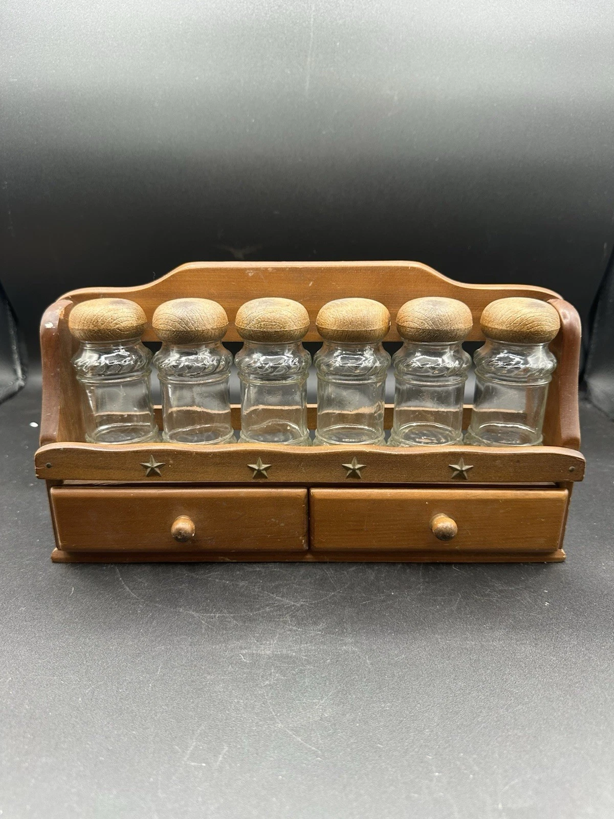 Vintage Wooden Spice Rack Featuring Six Glass Jars and Two Small Storage Drawers