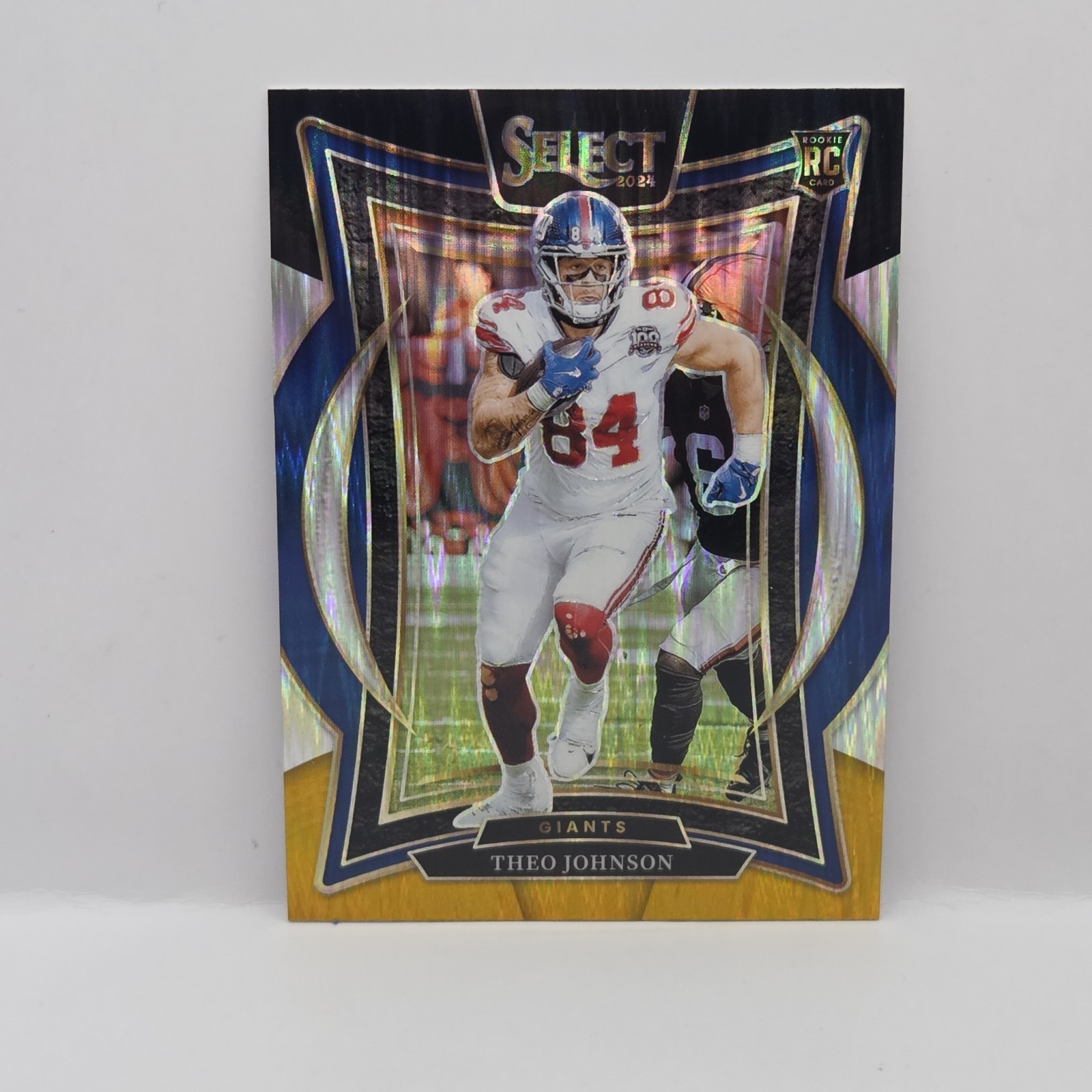Theo Johnson Panini Select #96 Black/Gold Shock