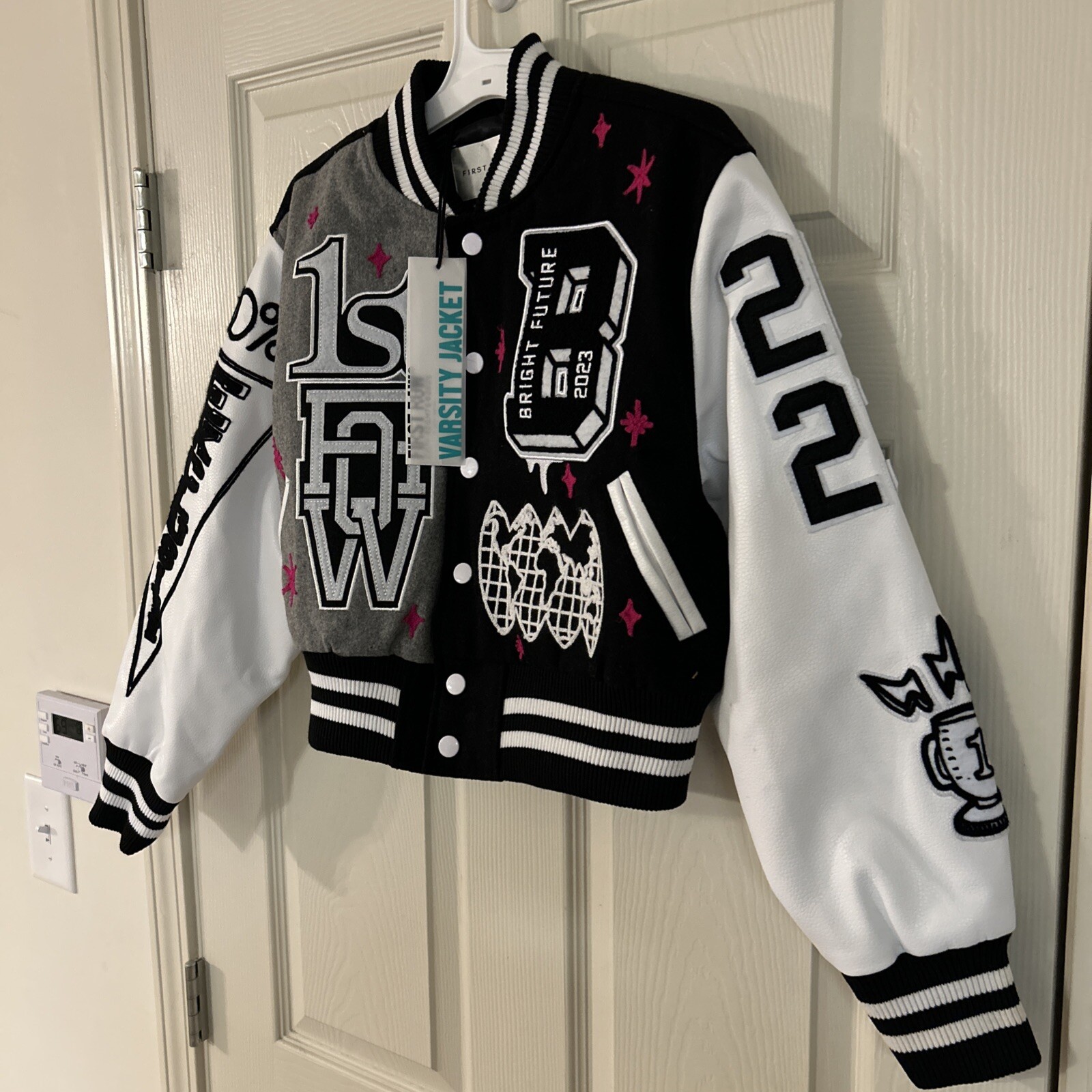 Giacca prima fila ecopelle manica toppe ricamate Varsity taglia media