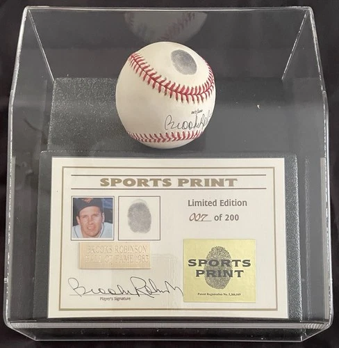 Brooks Robinson Signed Baseball With Thumbprint In Display Case. Beckett LOA