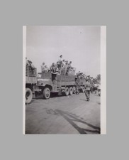 WW2 Photo U.S. GIs Military Trucks Filled With Civilians