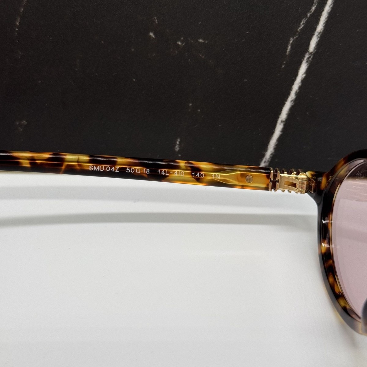 Miu Miu MU04ZS 14L4I0 Honey Havana/Pink 50-18-140 Sunglasses  display picture 1