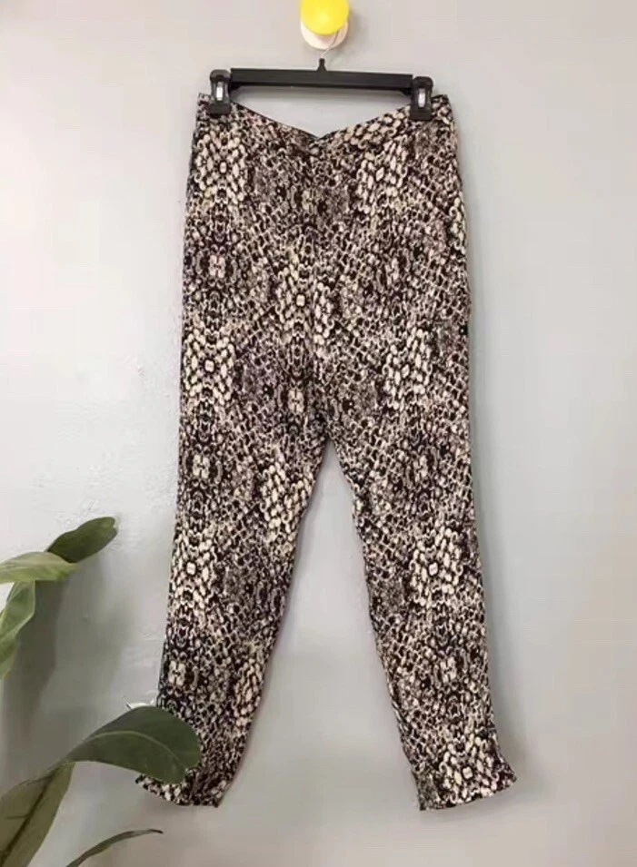 Pantalones de dardos cónicos de gancho y ojo de animal de seda marrón talla 4 Haute Hippie para mujer