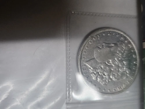 1896 O AU Morgan Silver Dollar