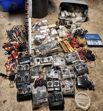RC AIRPLANE PARTS AND ACCESSORIES LOT REMOTE CONTROLS, PROPELLERS,GAS TANKS