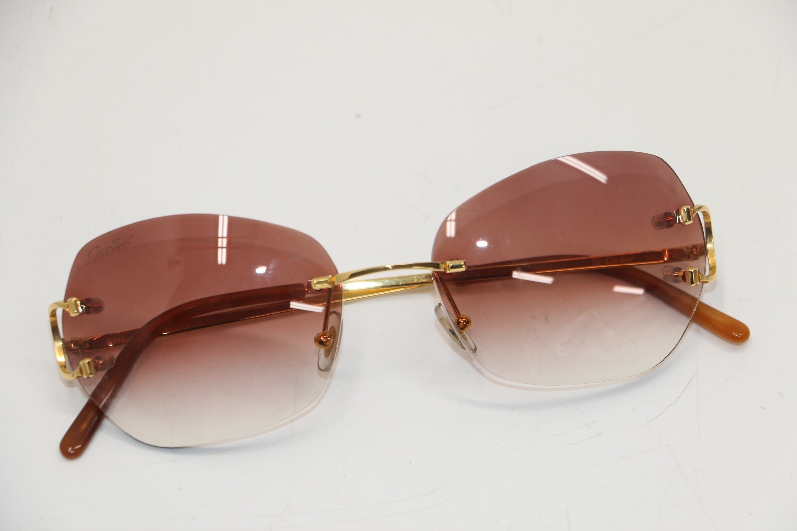 Cartier C Décor CT0092O Rimless Sunglasses - Gold for sale online 