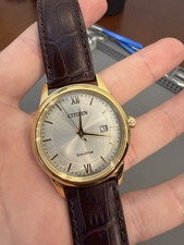 Citizen Eco-Drive Quartz Date Mens Watch Gold...