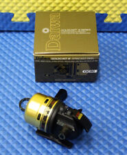 Daiwa GoldCast GC120 Spincast Left/Right Hand Fishing Reel - Black/Gold for  sale online